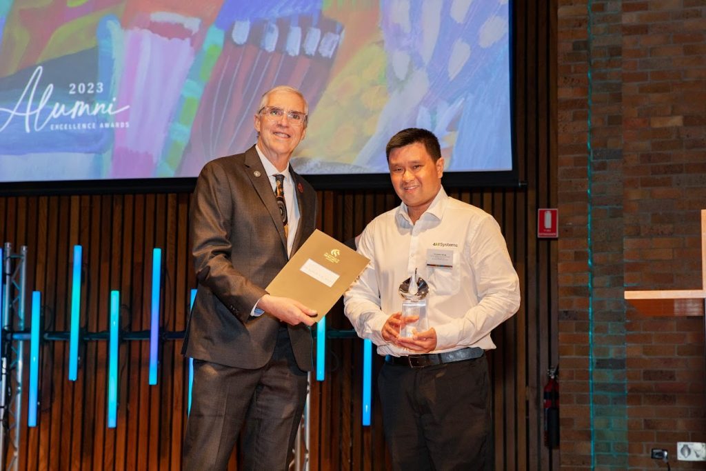 Aaron with his award