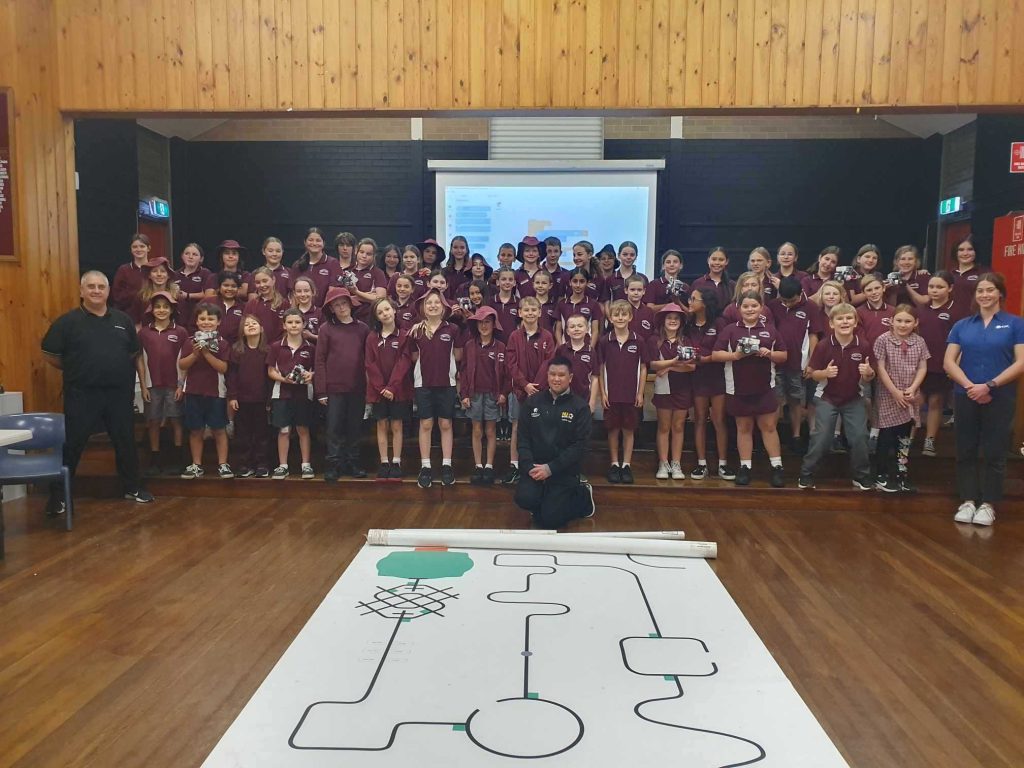 The 4Tel and 4AI Systems team alongside 60 students